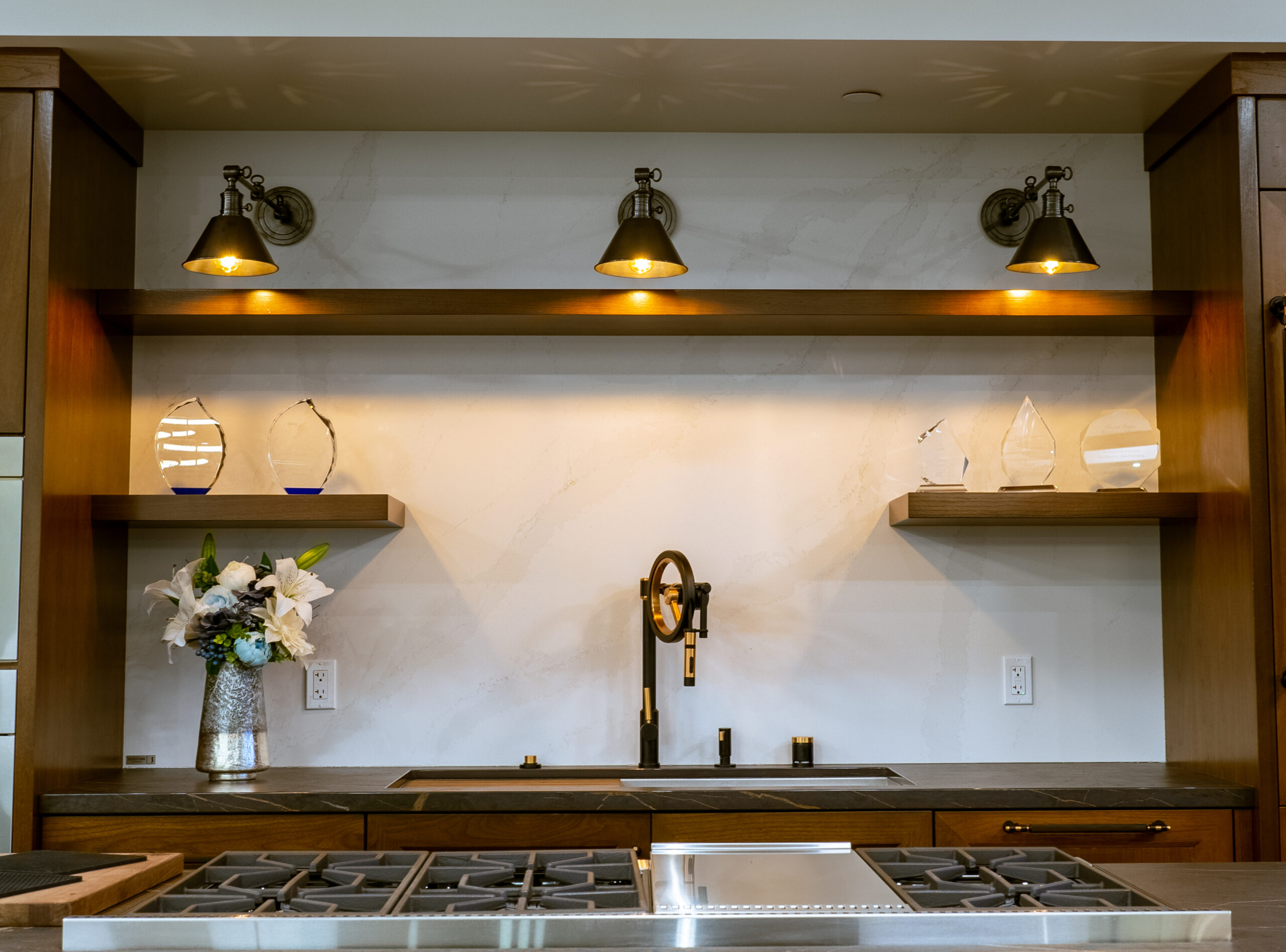 Commercial kitchen display with warm can lights shinning onto the display. 